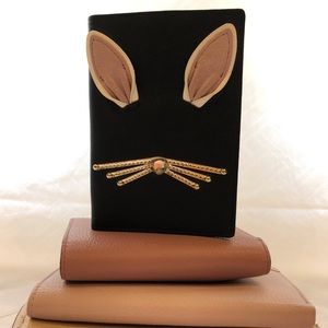 Kate Spade black bunny passport holder
